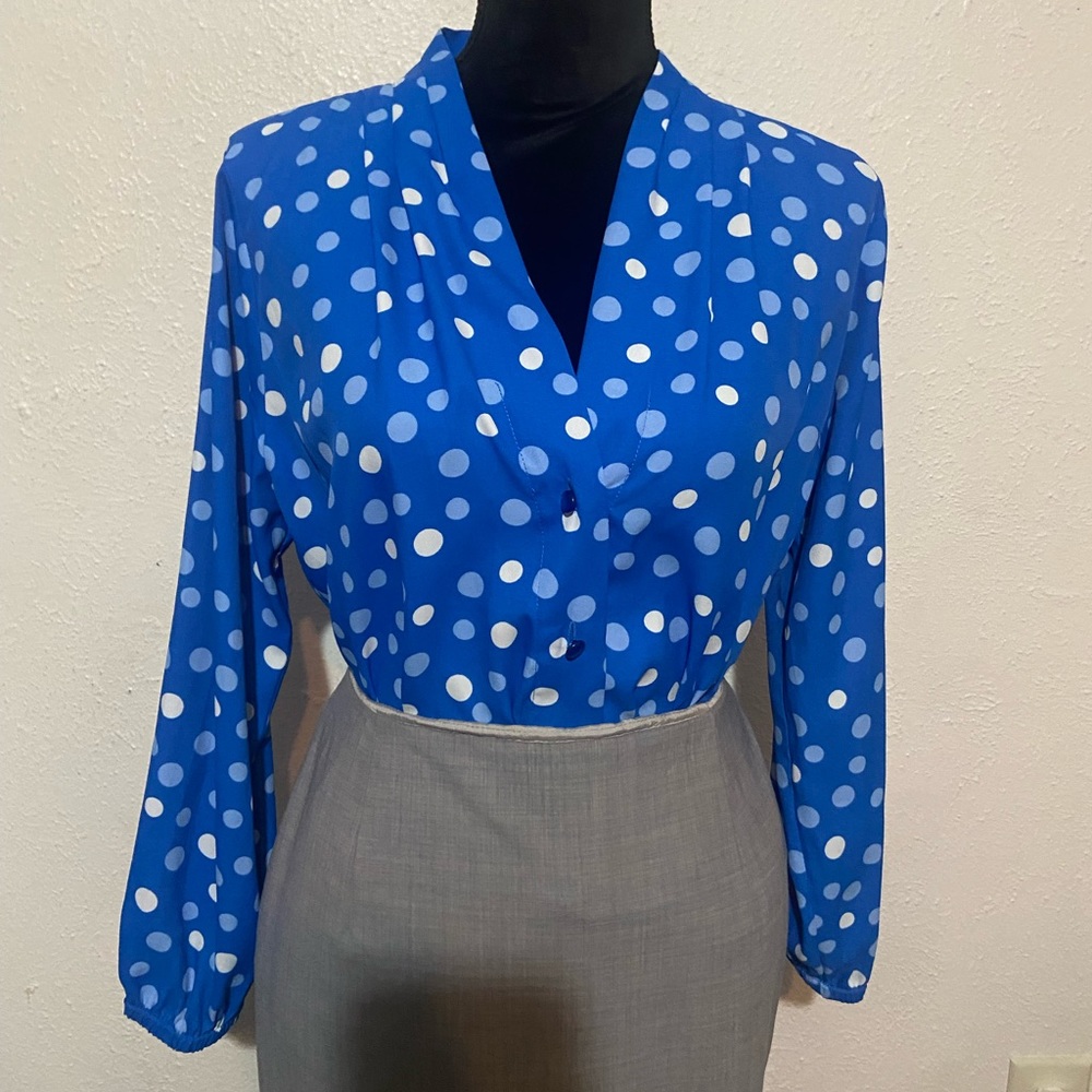 Beautiful blue polka dot blouse.